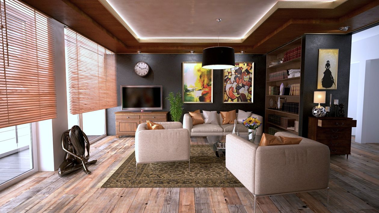 A savvy homeowner sits in a bright, modern living room, carefully reviewing a real estate document, looking confident and in control of the negotiation process.